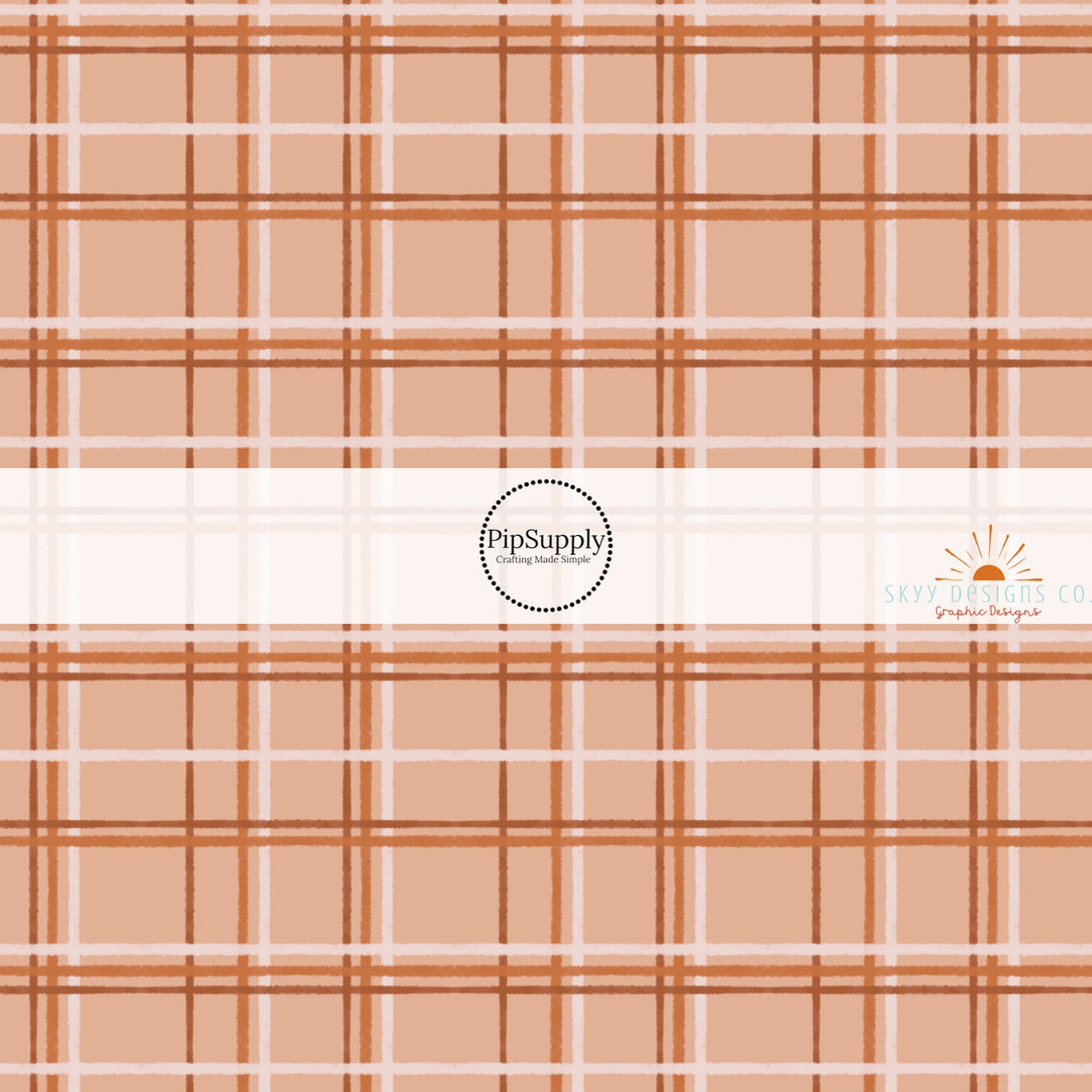 These autumn themed pattern fabric by the yard features the following design elements: fall plaid pattern. This fun themed fabric can be used for all your sewing and crafting needs.