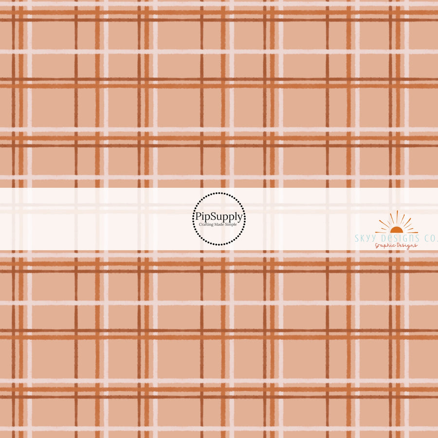 These autumn themed pattern fabric by the yard features the following design elements: fall plaid pattern. This fun themed fabric can be used for all your sewing and crafting needs.