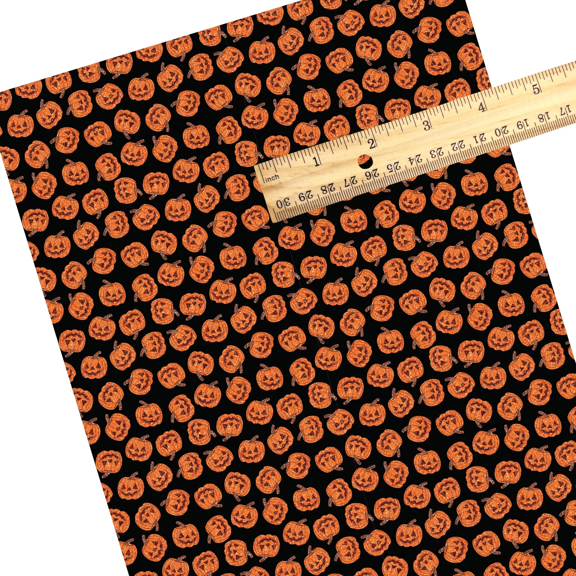 These Halloween themed pattern faux leather sheets contain the following design elements: orange pumpkins on black. Our CPSIA compliant faux leather sheets or rolls can be used for all types of crafting projects.