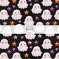 These Halloween themed pattern fabric by the yard features the following design elements: ghost and tiny colorful stars on black. This fun spooky themed fabric can be used for all your sewing and crafting needs!