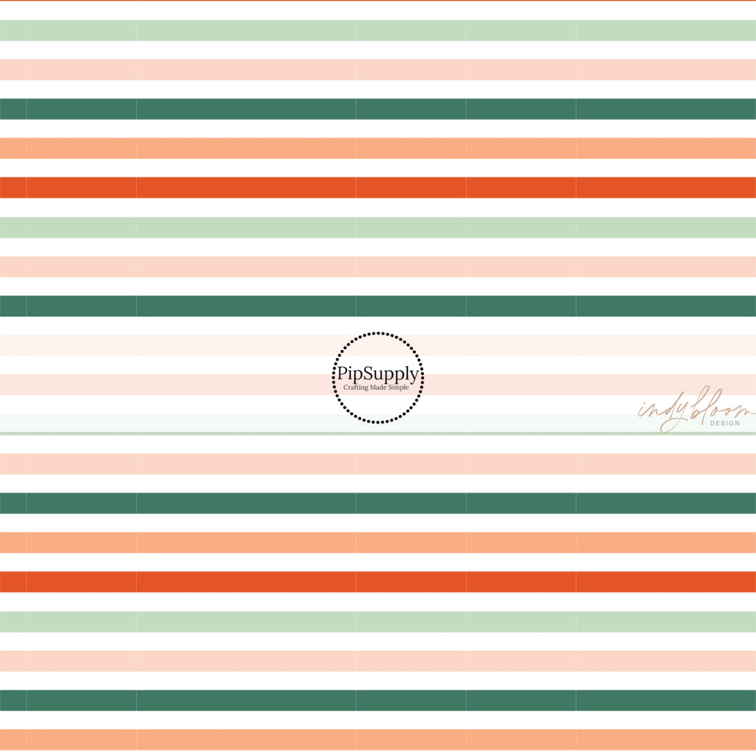 These winter stripe themed pattern fabric by the yard features the following design elements: Christmas colorful stripes. This fun themed fabric can be used for all your sewing and crafting needs!