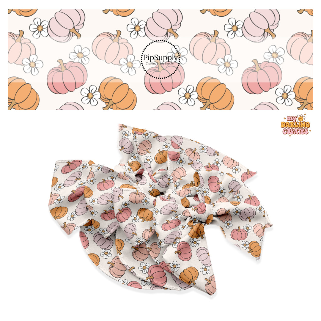 White flower with multi pumpkins on cream hair bow strips