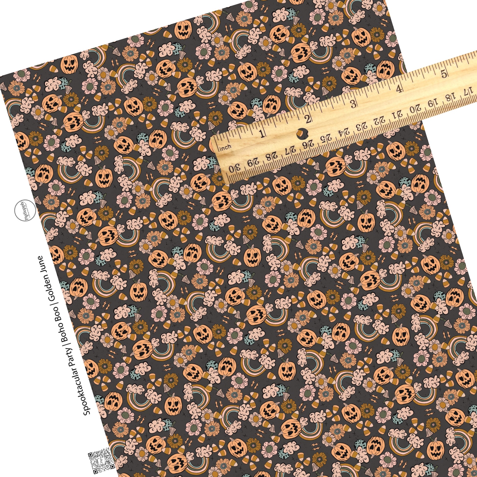 Scattered halloween party on dark gray faux leather sheets