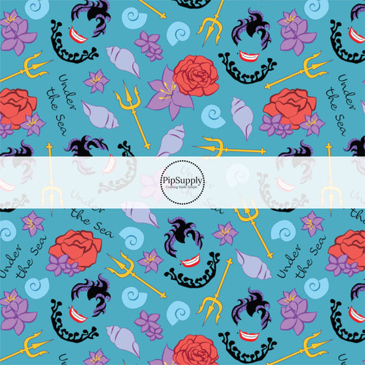 This ocean inspired fabric by the yard features the following design: floral sea witch and conch shells on blue. This fun themed fabric can be used for all your sewing and crafting needs!