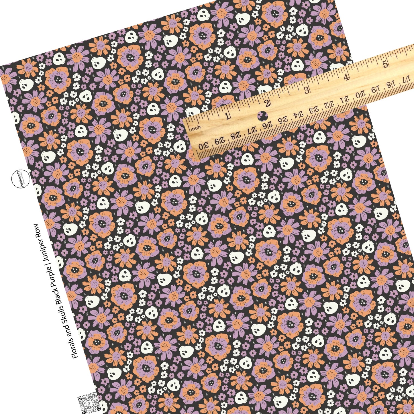 Purple and orange flowers with white skulls on black faux leather sheets