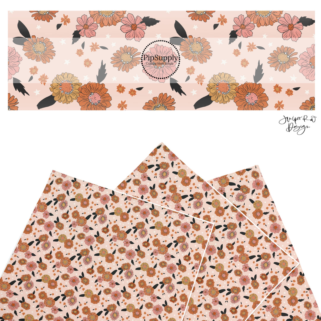 These Halloween themed pattern faux leather sheets contain the following design elements: multi color flowers on light pink. Our CPSIA compliant faux leather sheets or rolls can be used for all types of crafting projects.