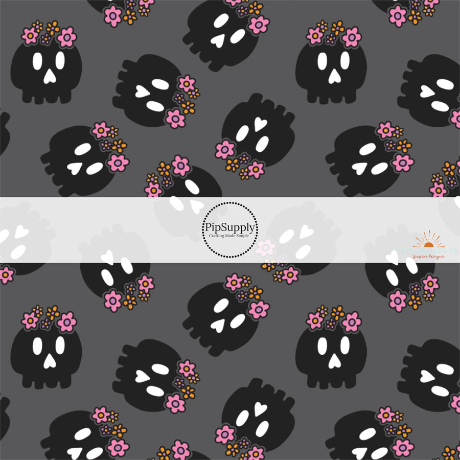 These Halloween themed pattern fabric by the yard features the following design elements: skulls with flowers. This fun spooky themed fabric can be used for all your sewing and crafting needs!