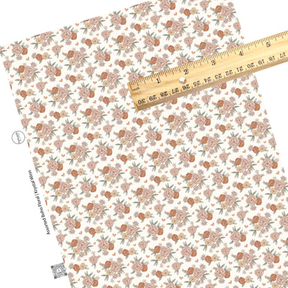 Rust and peach flowers and hearts on cream faux leather sheets