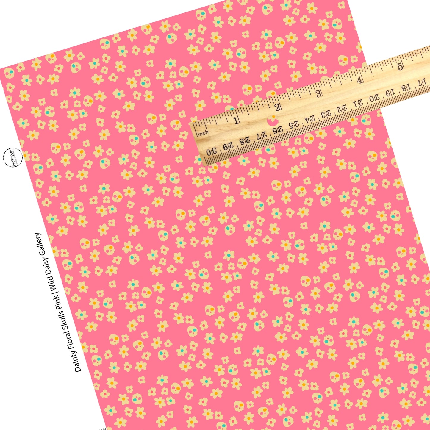 Floral skulls with colorful accents on pink faux leather sheets