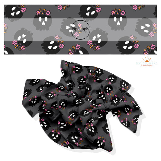 These Halloween themed no sew bow strips can be easily tied and attached to a clip for a finished hair bow. These fun spooky patterned bow strips are great for personal use or to sell. These bow strips feature the following design elements: skulls with flowers.