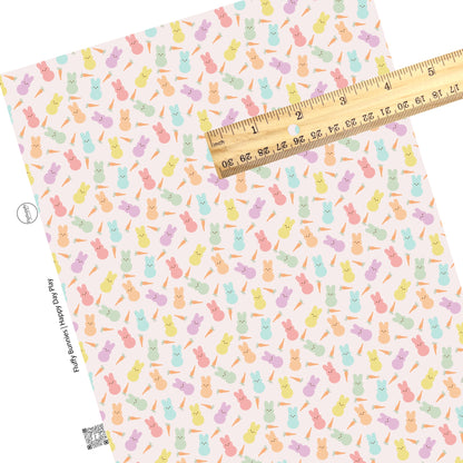 These spring pattern themed faux leather sheets contain the following design elements: pastel colored bunnies surrounded by carrots on pink. Our CPSIA compliant faux leather sheets or rolls can be used for all types of crafting projects.