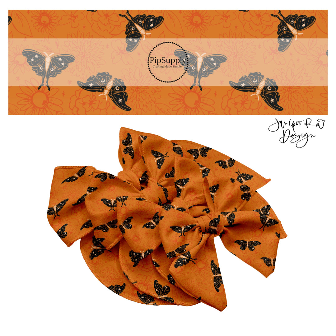 Black celestial moths on floral orange hair bow strips