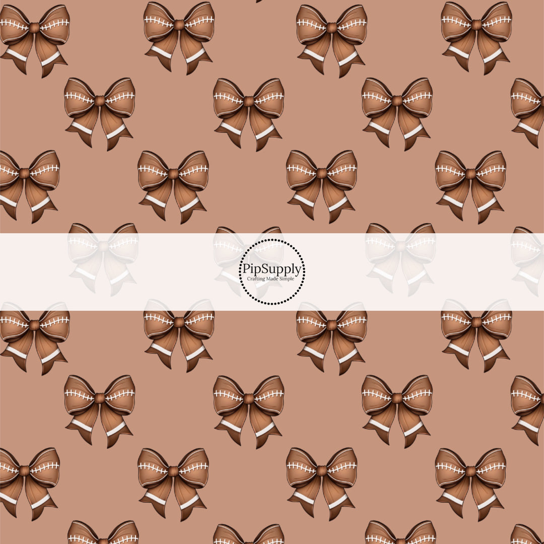 These sports themed fabric by the yard features brown football bows. This fun pattern fabric can be used for all your sewing and crafting needs!