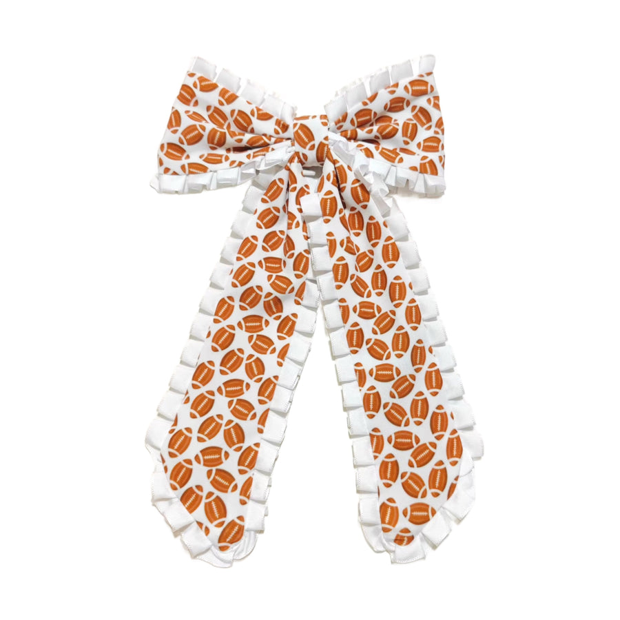 These sports ribbon edge long tail pre-cut tied bows are ready to package and resell to your customers no sewing or measuring necessary! These hair bows come with a clip already attached.