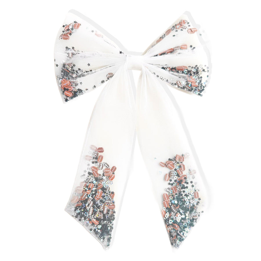 These sports tulle long tail shaker tied bows are ready to package and resell to your customers no sewing or measuring necessary! These hair bows come with a clip already attached. The tulle shaker bow comes pre-filled with football pattern clay mix.