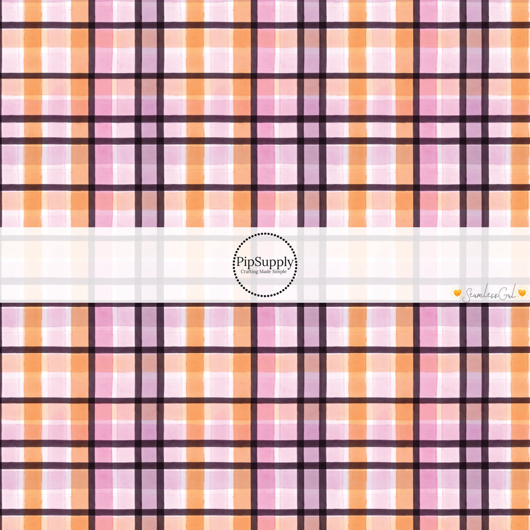 These Halloween themed pattern fabric by the yard features the following design elements: black, pink, and orange plaid pattern. This fun spooky themed fabric can be used for all your sewing and crafting needs!