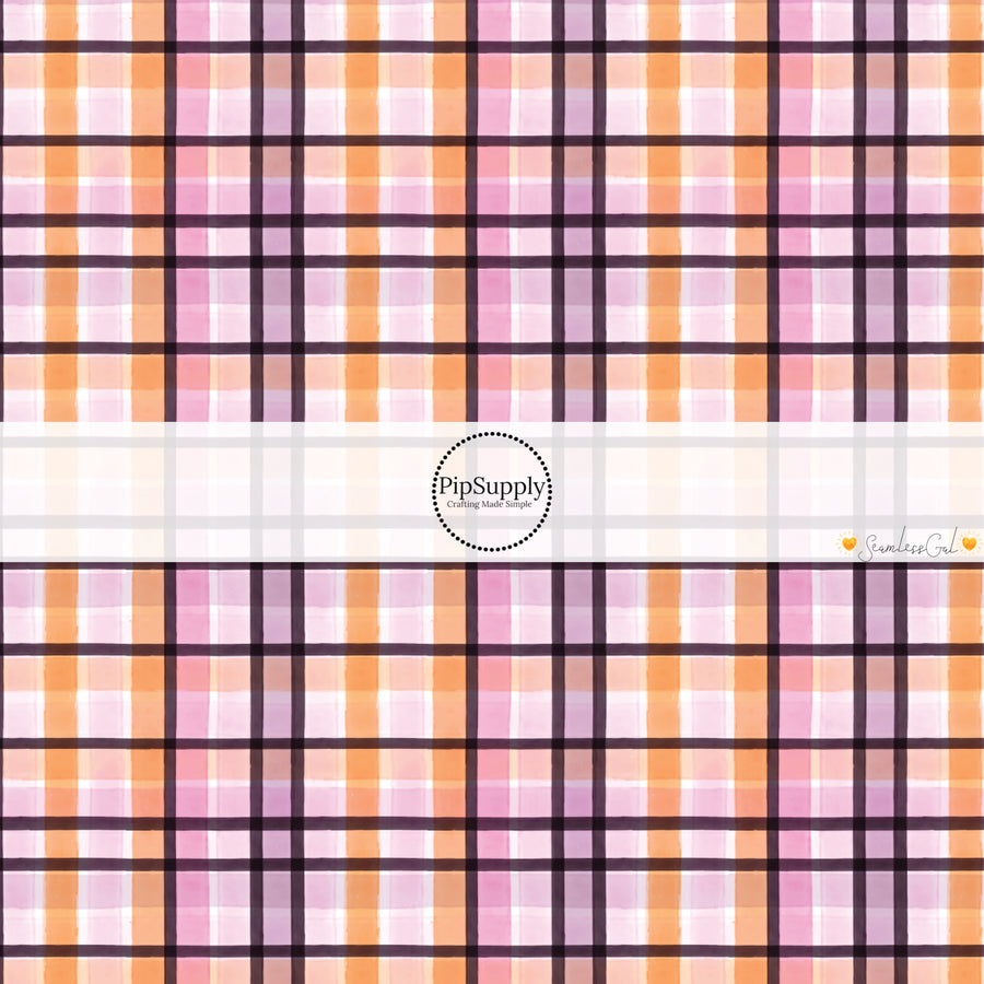 These Halloween themed pattern fabric by the yard features the following design elements: black, pink, and orange plaid pattern. This fun spooky themed fabric can be used for all your sewing and crafting needs!