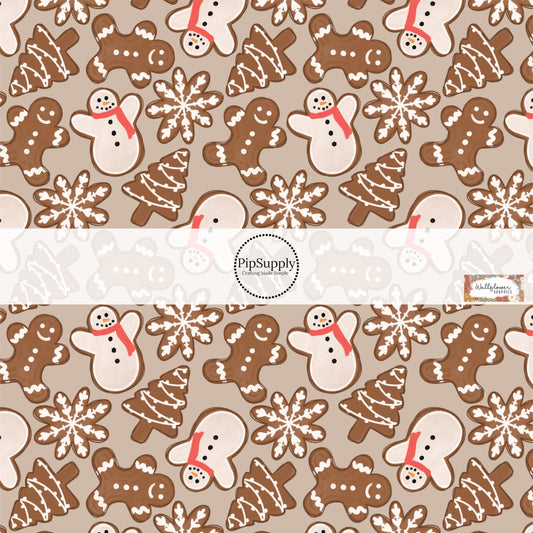 These Christmas themed pattern fabric by the yard features the following design elements: frosted gingerbread cookies on brown. This fun themed fabric can be used for all your sewing and crafting needs!