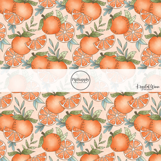 These fruit on light blush fabric by the yard features oranges and orange slices.