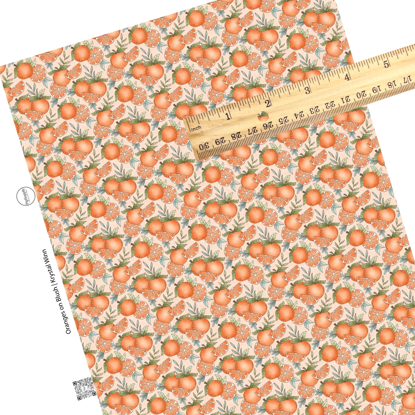 These fruit on light blush faux leather sheets contain the following design elements: oranges and orange slices. 