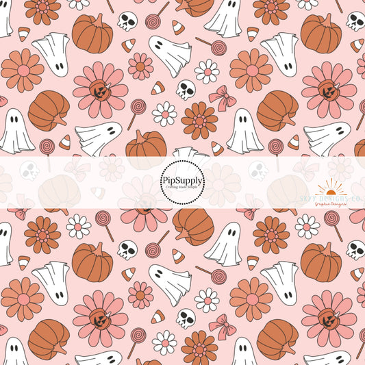 These Halloween themed pattern fabric by the yard features the following design elements: pumpkins, ghost, and flowers on pink. This fun spooky themed fabric can be used for all your sewing and crafting needs!