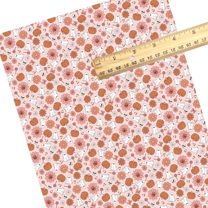 These Halloween themed pattern faux leather sheets contain the following design elements: pumpkins, ghost, and flowers on pink. Our CPSIA compliant faux leather sheets or rolls can be used for all types of crafting projects.