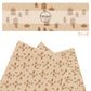 Gingerbread houses, gingerbread man, and polka dots on tan faux leather sheets
