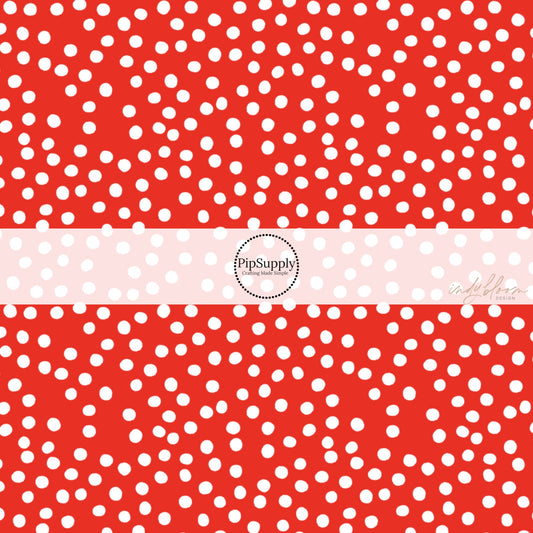 This 4th of July fabric by the yard features patriotic white dots on red. This fun patriotic themed fabric can be used for all your sewing and crafting needs!