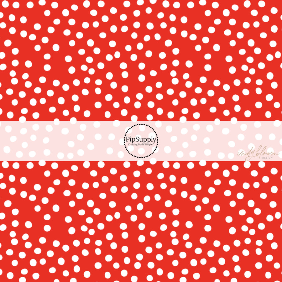 This 4th of July fabric by the yard features patriotic white dots on red. This fun patriotic themed fabric can be used for all your sewing and crafting needs!