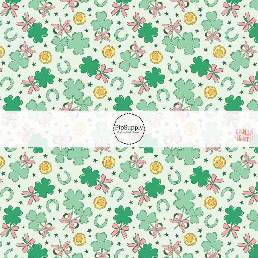 This holiday fabric by the yard features shamrocks, coins, and horseshoes on green. This festive pattern fabric can be used for all your sewing and crafting needs!