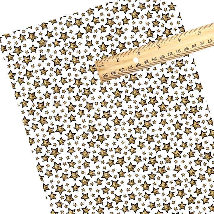 These holiday faux leather sheets contain the following design elements: gold foil stars. Our CPSIA compliant faux leather sheets or rolls can be used for all types of crafting projects.