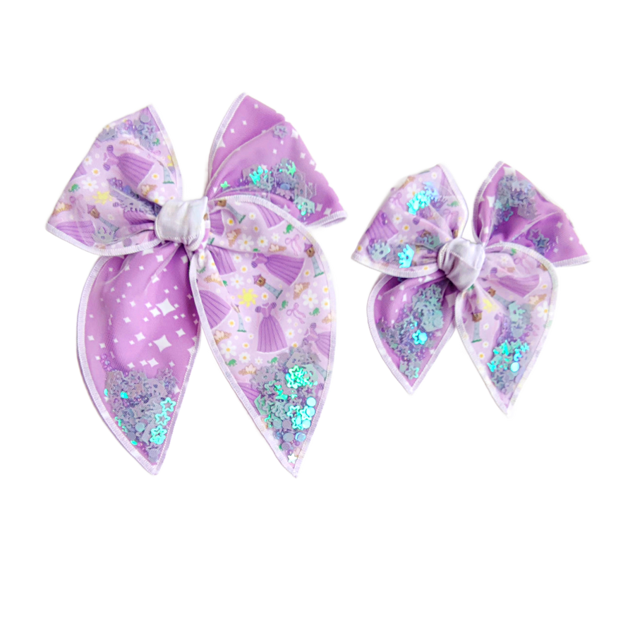 These princess themed shaker two toned pre-cut tied bows are ready to package and resell to your customers no sewing or measuring necessary! These hair bows come with a clip already attached. The shaker bows come pre-filled with princess inspired pattern mix.