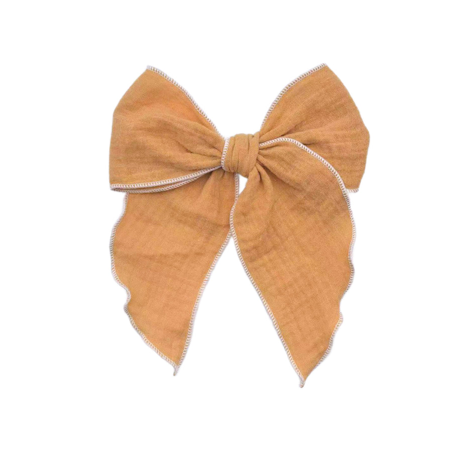 These solid pre-cut tied bows are ready to package and resell to your customers no sewing or measuring necessary! These hair bows come with a clip already attached.