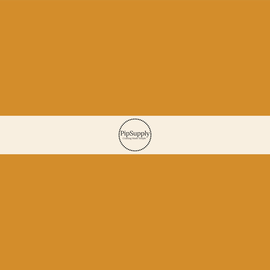This solid fabric by the yard is a solid golden yellow color. This fabric can be used for all your sewing and crafting needs! These solids coordinate with so many different patterns that we offer.
