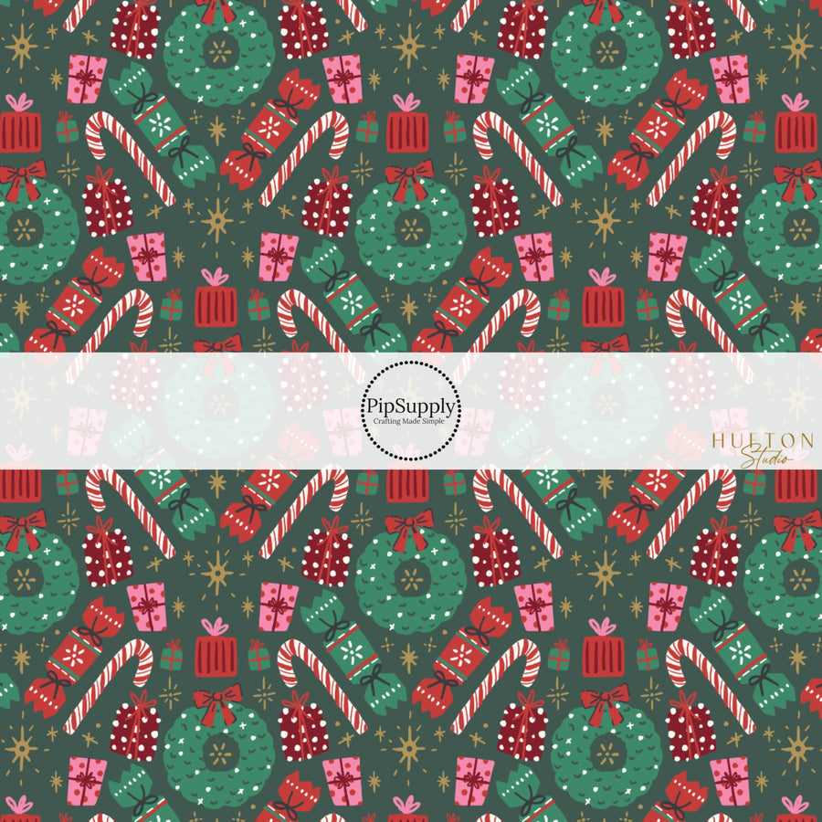 These Christmas themed pattern fabric by the yard features the following design elements: holiday wreaths, candy canes, and presents on green. This fun themed fabric can be used for all your sewing and crafting needs!