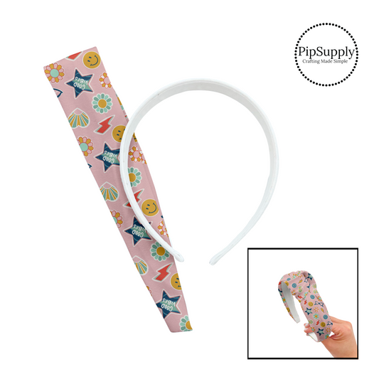 Flowers, good vibes star, smiley face, lightning bolt, and heart stickers on pink knotted headband kit