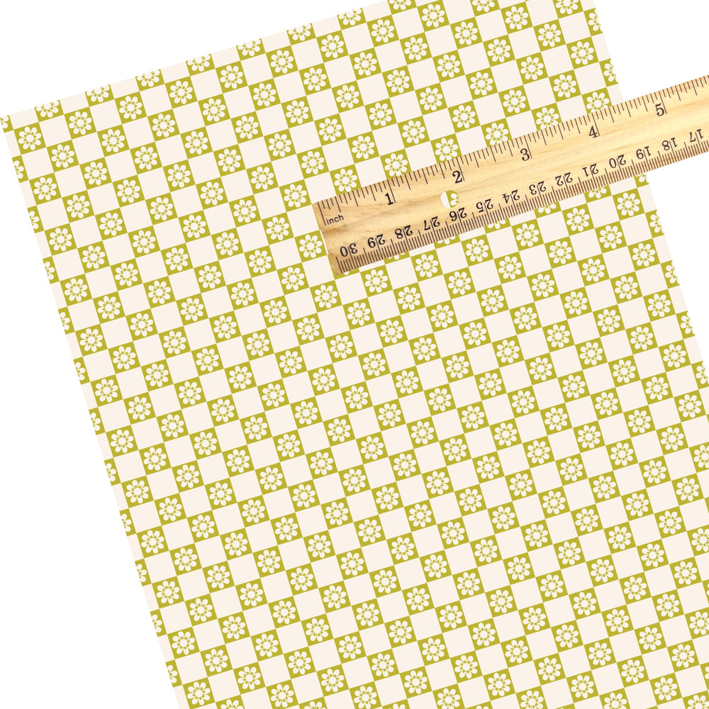 These spring themed faux leather sheets contain the following design elements: daisy flowers on green and cream checkers. Our CPSIA compliant faux leather sheets or rolls can be used for all types of crafting projects.