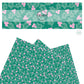 Pink berries and green holly leaves on green faux leather sheets