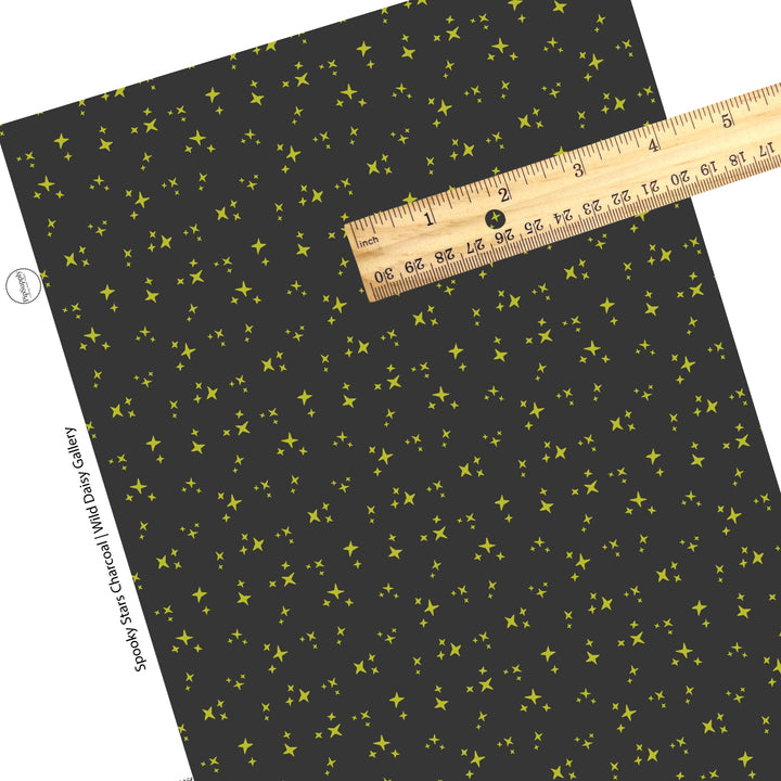 Green scattered stars on charcoal faux leather sheets