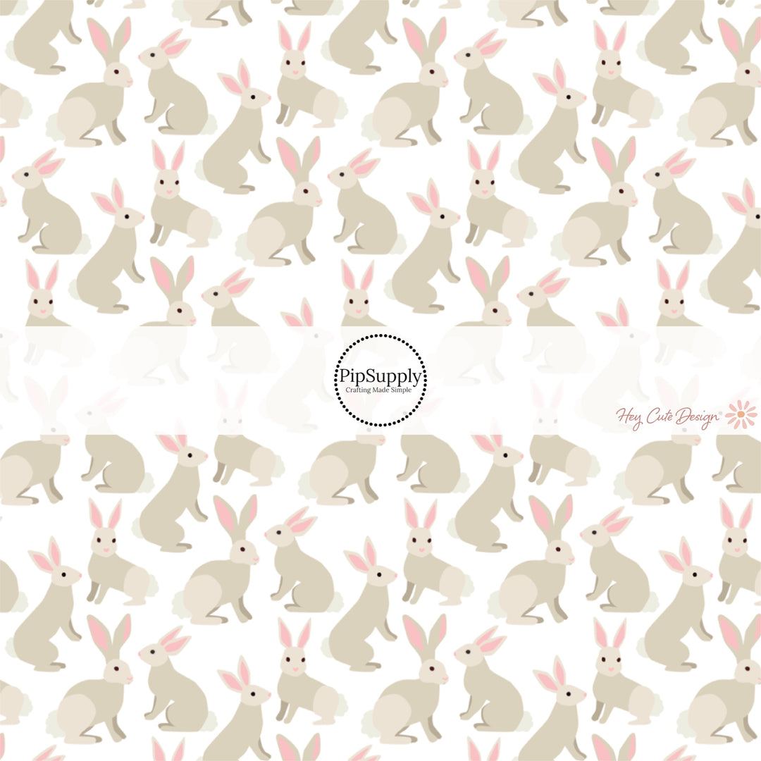 This Easter themed fabric by the yard features Easter bunnies. This fun pattern fabric can be used for all your sewing and crafting needs!