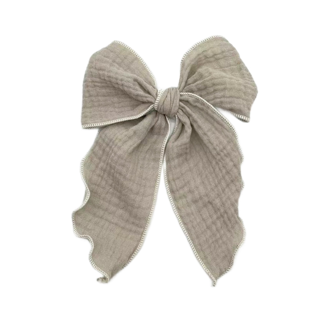 These solid pre-cut tied bows are ready to package and resell to your customers no sewing or measuring necessary! These hair bows come with a clip already attached.
