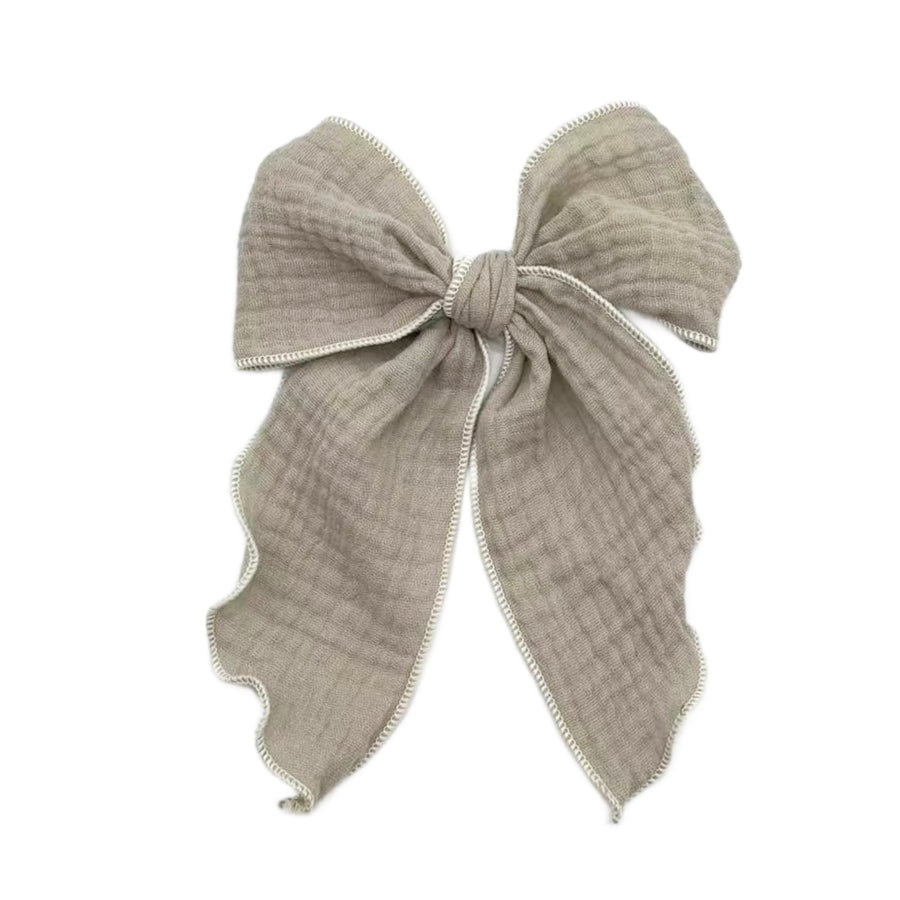 These solid pre-cut tied bows are ready to package and resell to your customers no sewing or measuring necessary! These hair bows come with a clip already attached.