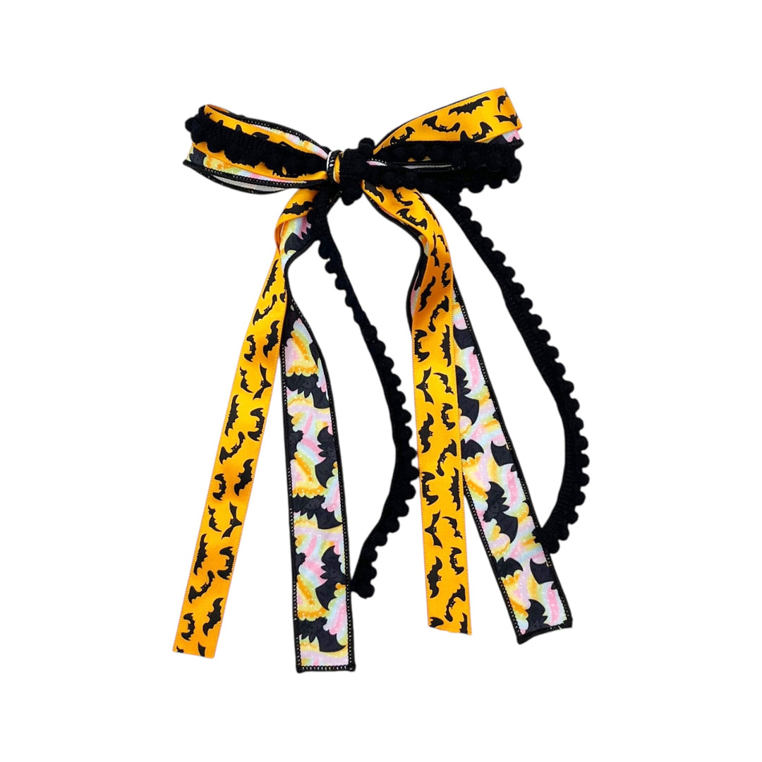 These Halloween themed ribbon tied bows are ready to package and resell to your customers no sewing or measuring necessary! These hair bows come with a clip already attached.