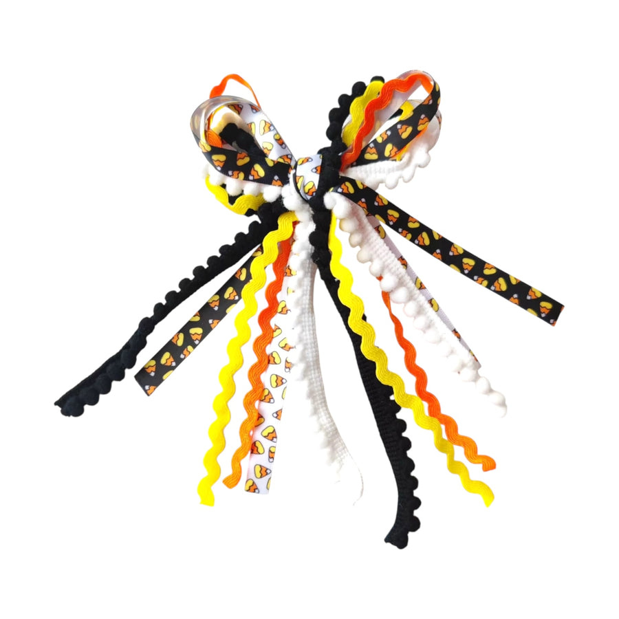 These Halloween colored messy ribbon tied bows are ready to package and resell to your customers no sewing or measuring necessary! These hair bows come with a clip already attached.