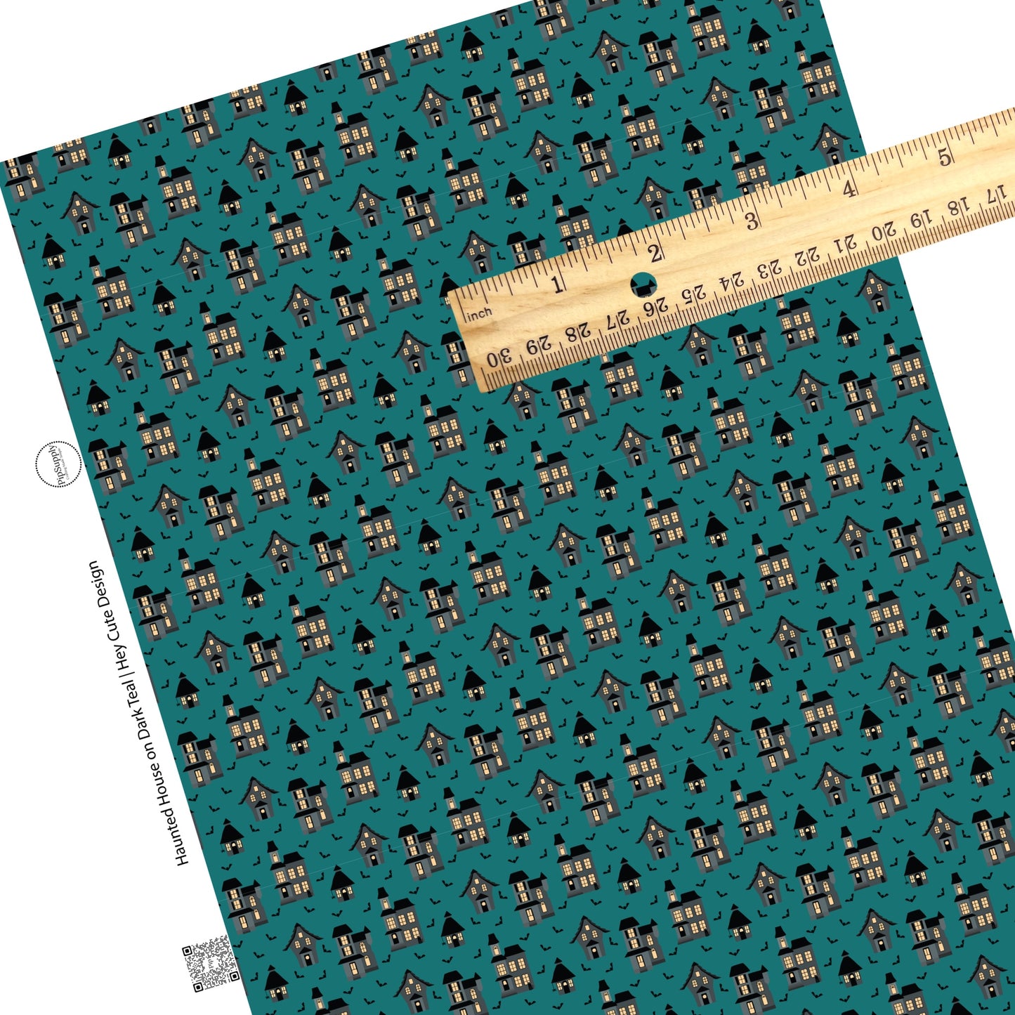 Spooky halloween houses and bats on teal faux leather sheets