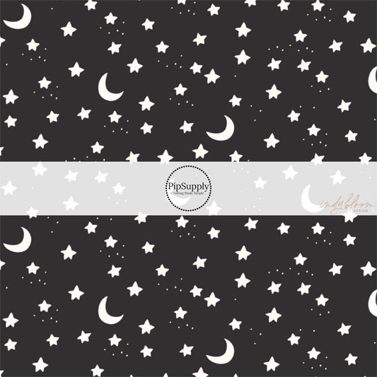 These Halloween themed pattern fabric by the yard features the following design elements: stars and moons on black. This fun spooky themed fabric can be used for all your sewing and crafting needs!