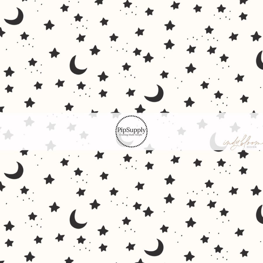 These Halloween themed pattern fabric by the yard features the following design elements: stars and moons on cream. This fun spooky themed fabric can be used for all your sewing and crafting needs!