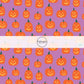 These Halloween themed pattern fabric by the yard features the following design elements: orange carved pumpkins. This fun spooky themed fabric can be used for all your sewing and crafting needs!