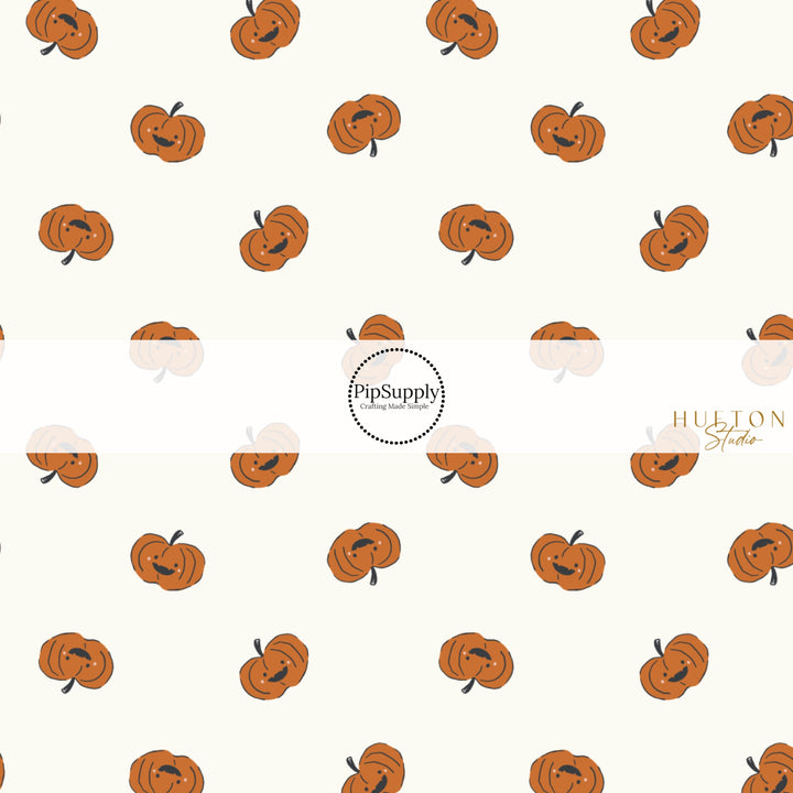 These Halloween themed pattern fabric by the yard features the following design elements: orange pumpkins on cream. This fun spooky themed fabric can be used for all your sewing and crafting needs!