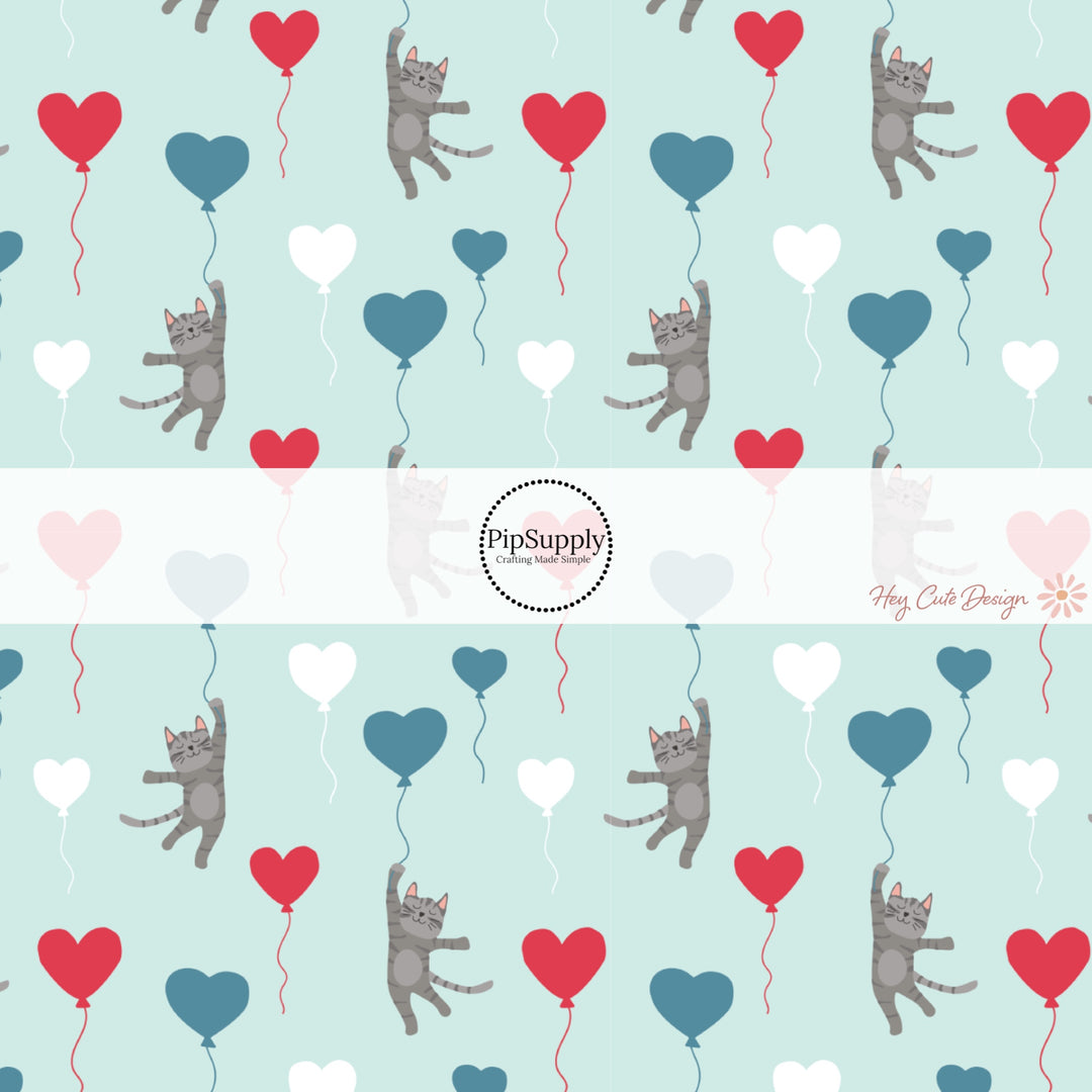 This holiday fabric by the yard features colorful heart balloons and kittens. This festive pattern fabric can be used for all your sewing and crafting needs!